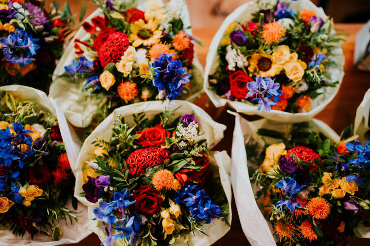 Flowers Bouquets Multicoloured Bride Bridesmaids Rainbow Colourful Cool Humanist Pool Wedding http://www.stevebridgwoodphotography.co.uk/