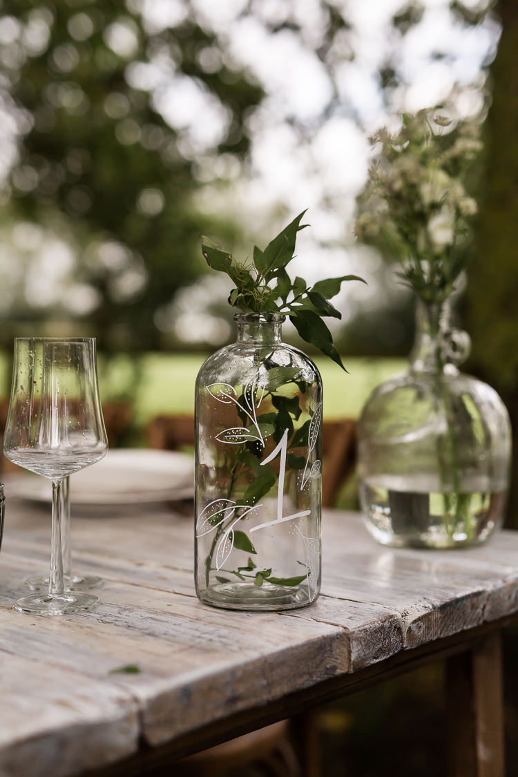 Bottle Foliage Decor Organic Rustic Greenery Wedding Ideas http://sarahbrookesphotography.com/