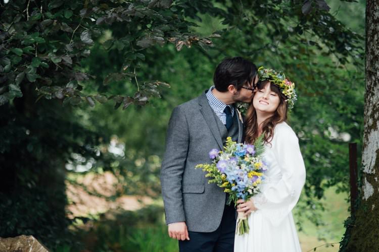 Bride Bridal Flower Crown Wildflower Bouquet Meadow long Sleeve Silk Dress 70s Grey Tweed Suit Navy Trousers Gingham Shirt Blue Adventurous Festival Bohemian Wedding https://libertypearlphotography.com/