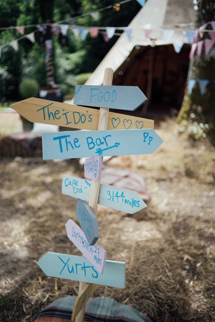 DIY Wood Signpost Directions Homemade Adventurous Festival Bohemian Wedding https://libertypearlphotography.com/
