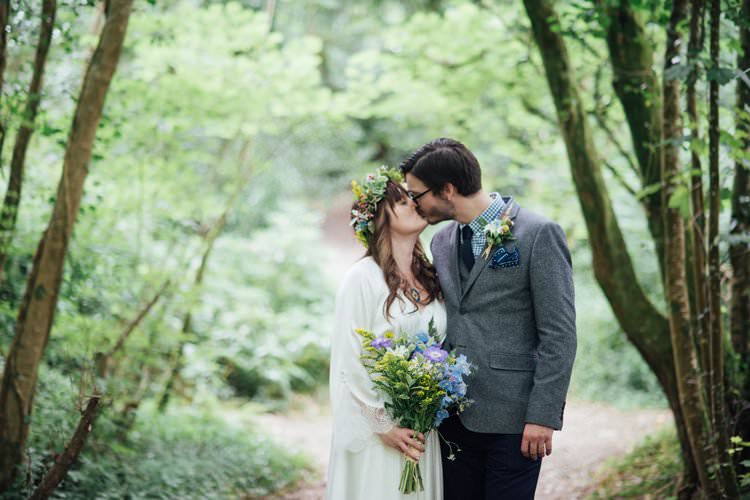 Bride Bridal Flower Crown Wildflower Bouquet Meadow long Sleeve Silk Dress 70s Grey Tweed Suit Navy Trousers Gingham Shirt Blue Adventurous Festival Bohemian Wedding https://libertypearlphotography.com/