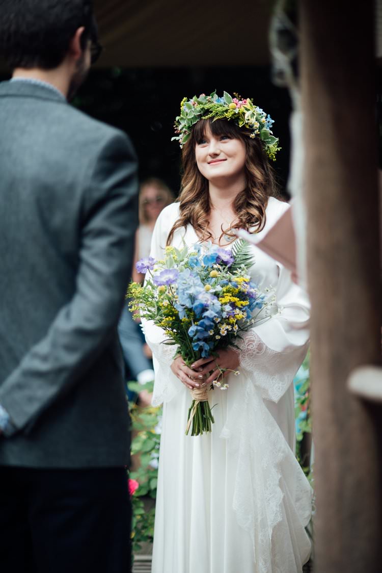 Bride Bridal Flower Crown Wildflower Bouquet Meadow long Sleeve Silk Dress Gown 70s Adventurous Festival Bohemian Wedding https://libertypearlphotography.com/
