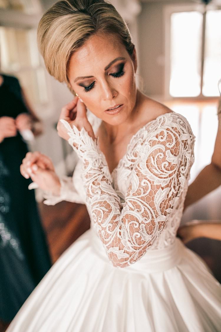 Bride Lace Sleeves Winter Gown Romantic Updo Pnina Tornai | Festive Glamour Christmas New Years Eve Wedding http://www.stevendrayimages.com/