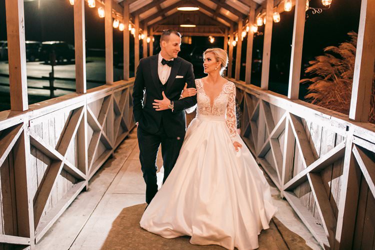 Winter Barn Wedding Bride Groom Long Sleeved Dress | Festive Glamour Christmas New Years Eve Wedding http://www.stevendrayimages.com/