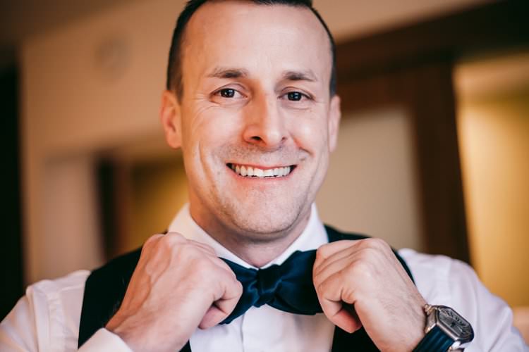 Morning Groom Prep Navy Suit Bow Tie Smile Waistcoat | Festive Glamour Christmas New Years Eve Wedding http://www.stevendrayimages.com/