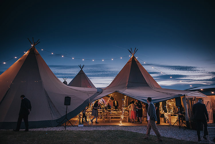 Tipi Lighting Festoons Happy Crafty Summer Farm Wedding http://twigandvine.photography/