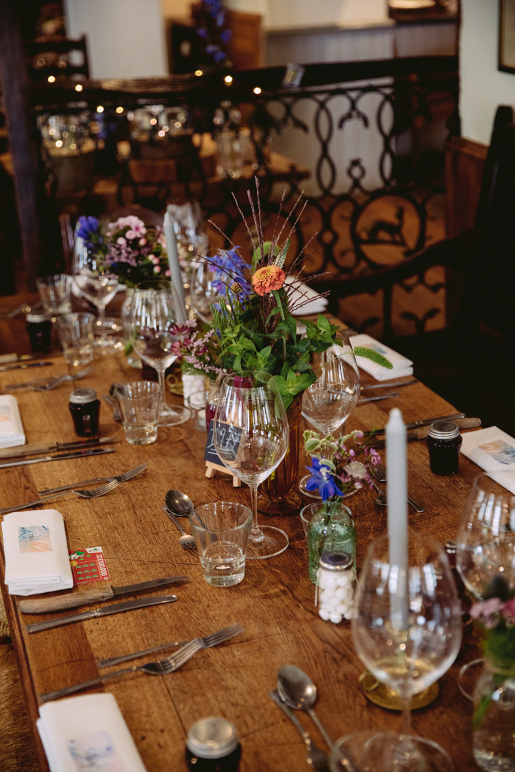 Bottle Jar Flowers Floral Mismatched Glass Candle Sticks Rustic Cosy Autumn Wedding Lake District http://hayleybaxterphotography.com/
