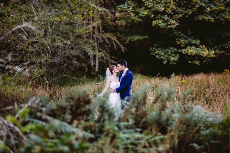 Bride Bridal Enzoani Fishtail Dress Gown Long Veil Navy Suit Rustic Cosy Autumn Wedding Lake District http://hayleybaxterphotography.com/