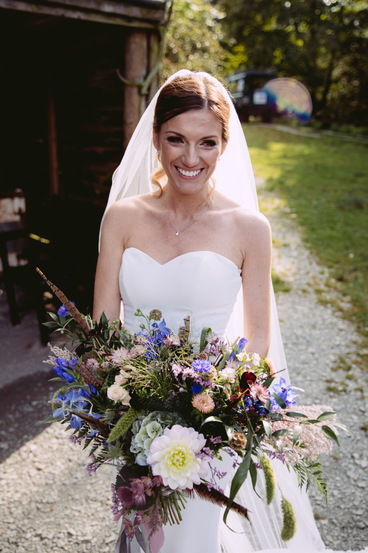 Bride Bridal Sweetheart Neckline Long Veil Bouquet Floral Wild Flower Feather Cornflower Fern Rustic Cosy Autumn Wedding Lake District http://hayleybaxterphotography.com/