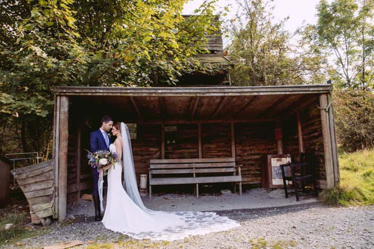 Bride Bridal Enzoani Fishtail Dress Gown Long Veil Navy Suit Rustic Cosy Autumn Wedding Lake District http://hayleybaxterphotography.com/