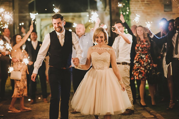Sparklers Exit Untraditional Pretty Travel Barn Wedding https://www.georgimabee.com/