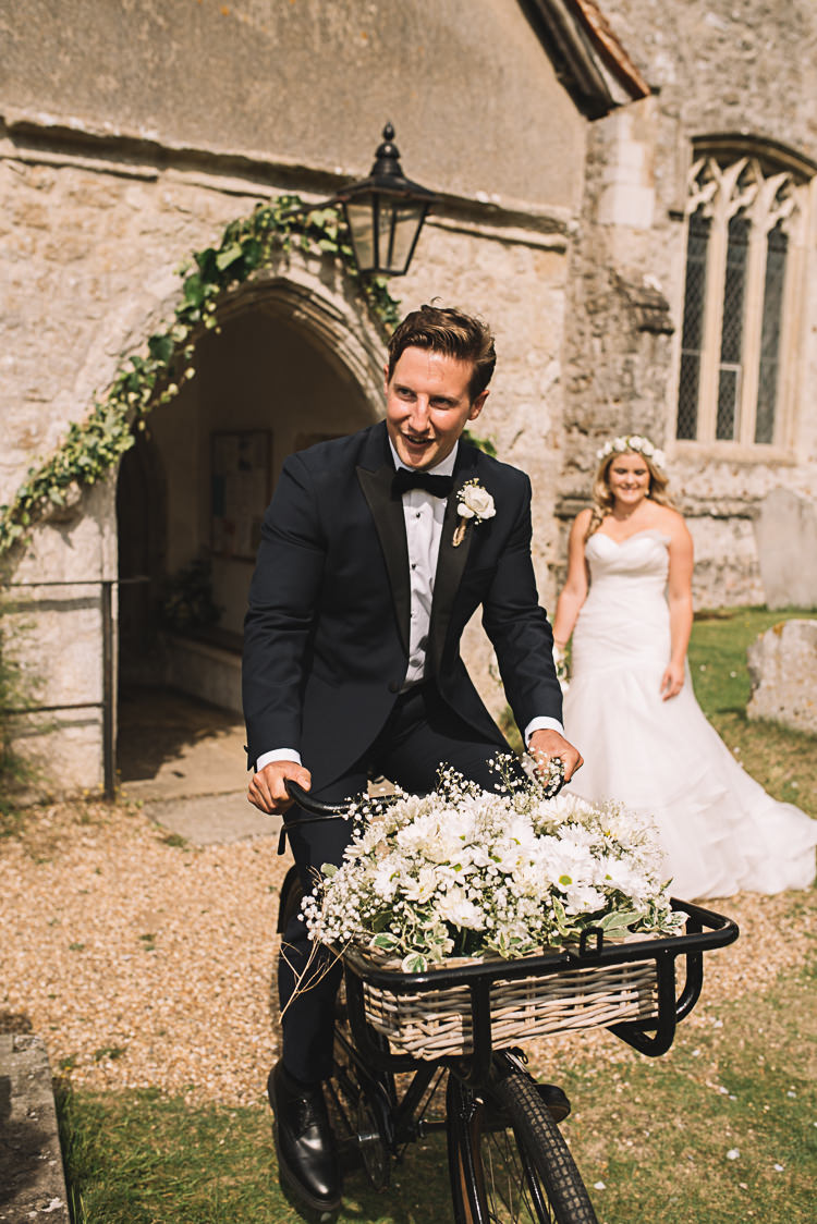Groom Bike Bicycle Tropical Boho Luxe Barn Wedding https://www.luciewatsonphotography.com/