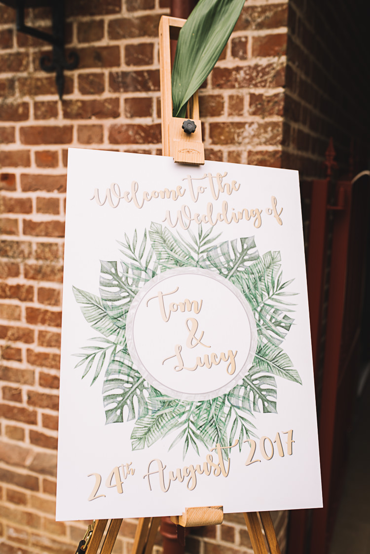 Sign Leaves Tropical Boho Luxe Barn Wedding https://www.luciewatsonphotography.com/