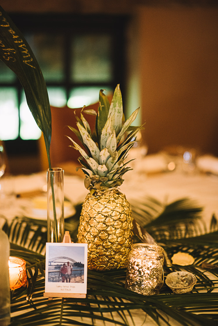 Gold Pineapple Leaves Palms Decor Candles Tables Tropical Boho Luxe Barn Wedding https://www.luciewatsonphotography.com/
