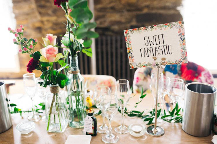 Table Name Centre Foliage Jars Bottles Glass Mismatched Twine Eucalyptus Colourful Floral Family Friendly Wedding http://www.sallytphoto.com/