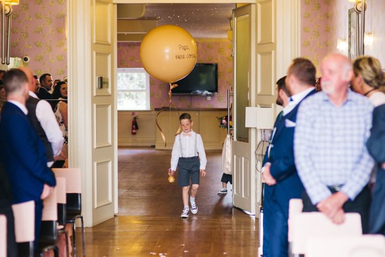 Page Boy Giant Oversize Balloon Modern Calligraphy Colourful Floral Family Friendly Wedding http://www.sallytphoto.com/