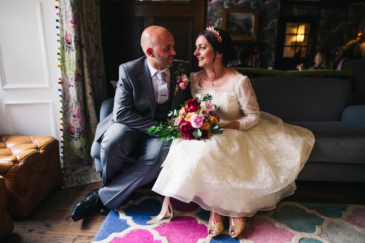 Bride Bridal Tea Length Louise Bentley Lace Three Quarter Sleeve T-Bar Shoes Rose Gold Leaf Crown Grey Suit Groom Jewel Tone Bouquet Peony Rose Colourful Floral Family Friendly Wedding http://www.sallytphoto.com/