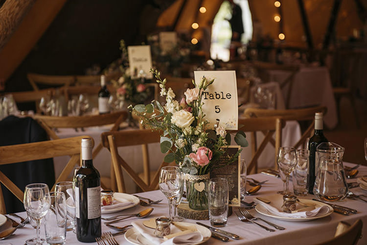 Table Centre Rustic Wood Slice Log Roses Pretty Floral Boho Tipi Wedding https://www.kindredphotography.co.uk/