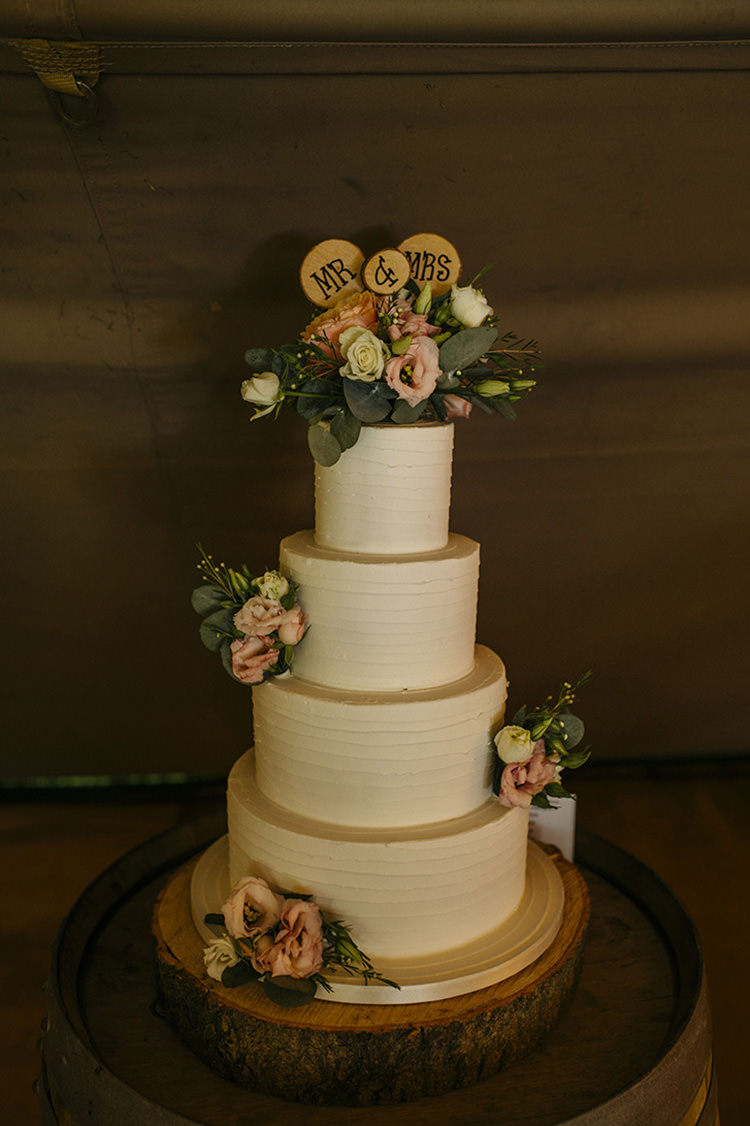 Buttercream Cake Floral Flowers Mr & Mrs Wood Slice Stand Pretty Floral Boho Tipi Wedding https://www.kindredphotography.co.uk/