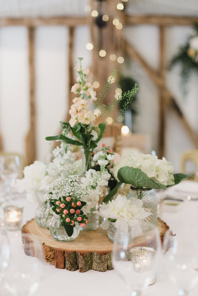 Flowers Centrepiece Table Decor Log Bottles Darling Peach Sage Green Grey Farm Wedding http://www.photographybybea.co.uk/