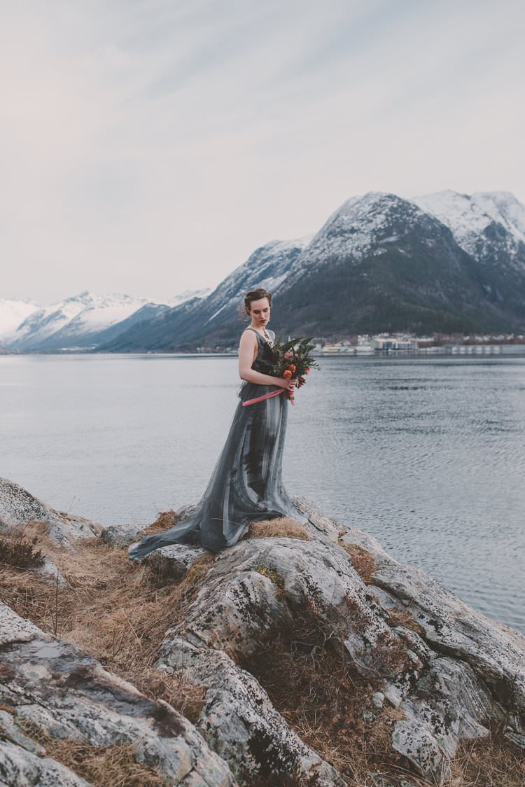 Bride Grey Black Couture Dress Norway Mountain Elopement | Moody Chic Norwegian Fjord Wedding Ideas https://www.anoukfotografeert.nl/