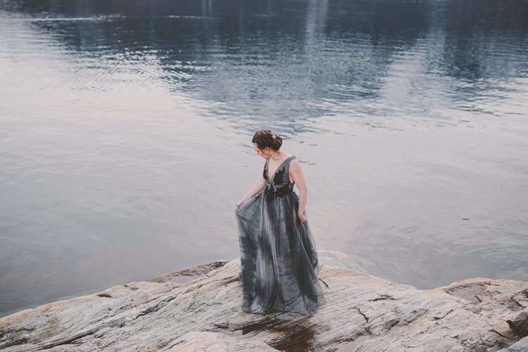 Bride Grey Black Couture Dress Updo Norway Mountain Elopement | Moody Chic Norwegian Fjord Wedding Ideas https://www.anoukfotografeert.nl/