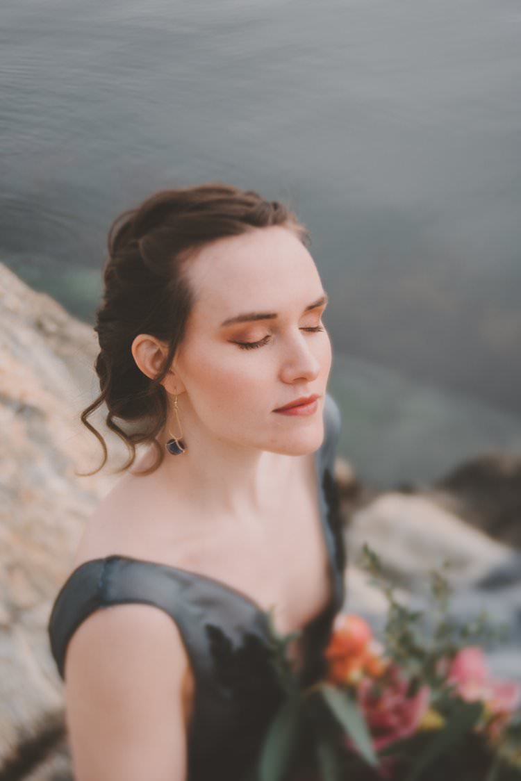 Bride Grey Black Couture Dress Updo Norway Mountain Elopement | Moody Chic Norwegian Fjord Wedding Ideas https://www.anoukfotografeert.nl/