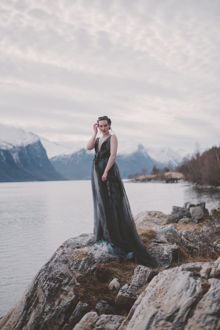 Bride Grey Black Couture Dress Updo Norway Mountain Elopement | Moody Chic Norwegian Fjord Wedding Ideas https://www.anoukfotografeert.nl/