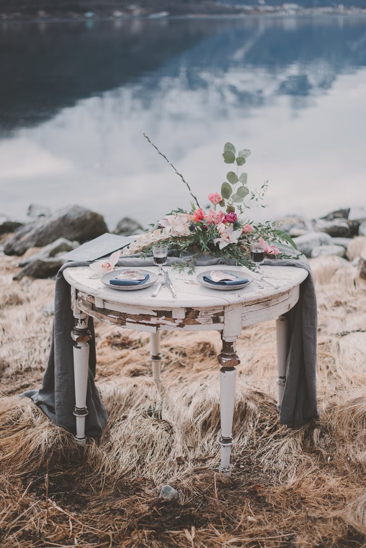 Table Grey Floral Centrepiece Bone Norway Mountain Elopement | Moody Chic Norwegian Fjord Wedding Ideas https://www.anoukfotografeert.nl/