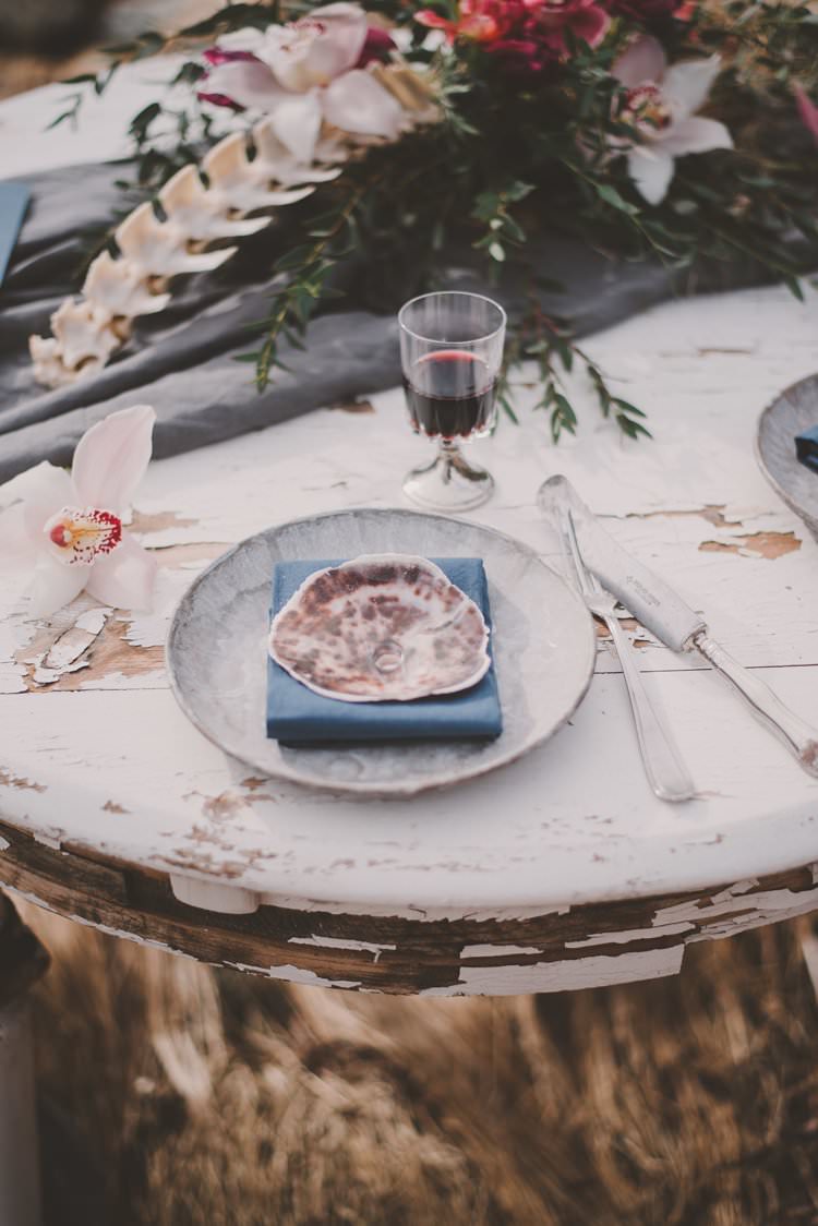 Table Blue Shell Bone Orchid Centrepiece Norway Mountain Elopement | Moody Chic Norwegian Fjord Wedding Ideas https://www.anoukfotografeert.nl/