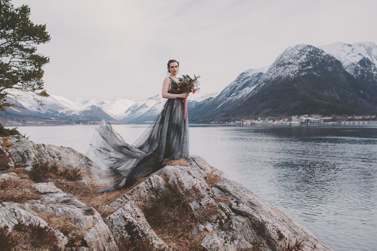 Bride Grey Black Couture Dress Bouquet Norway Mountain Elopement | Moody Chic Norwegian Fjord Wedding Ideas https://www.anoukfotografeert.nl/