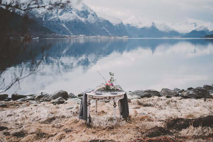 Table Grey Minimalist Flower Centerpiece Norway Mountain Elopement | Moody Chic Norwegian Fjord Wedding Ideas https://www.anoukfotografeert.nl/