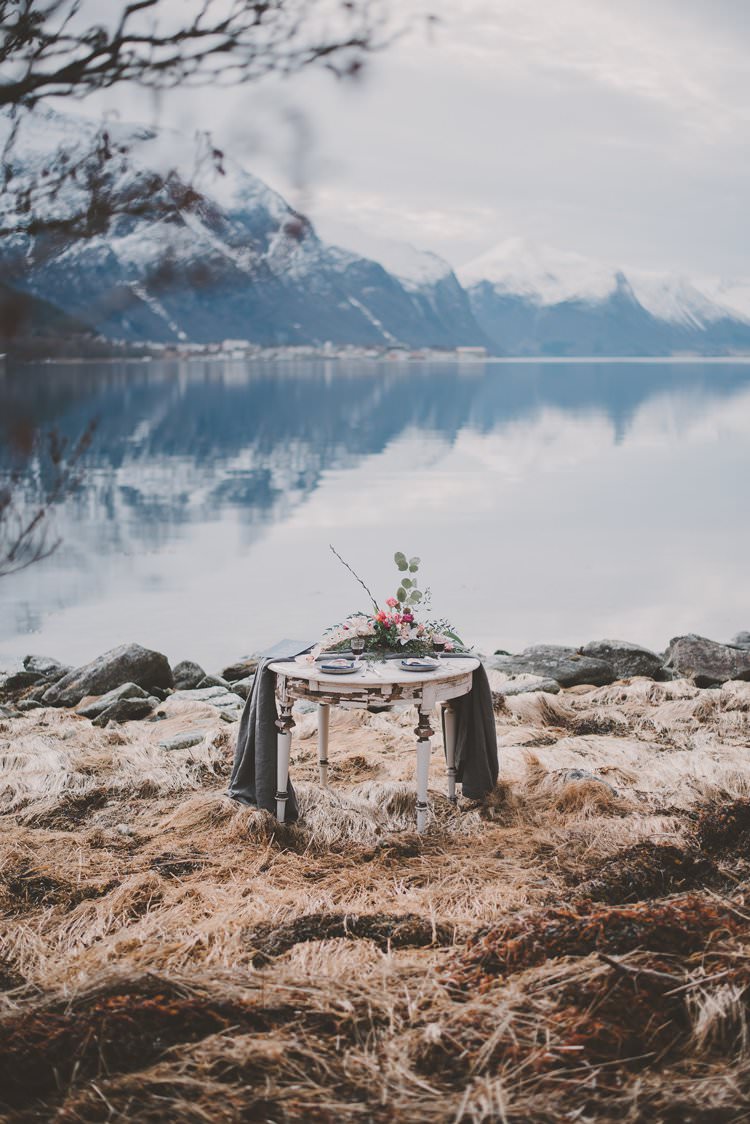 Table Grey Minimalist Flower Centerpiece Norway Mountain Elopement | Moody Chic Norwegian Fjord Wedding Ideas https://www.anoukfotografeert.nl/