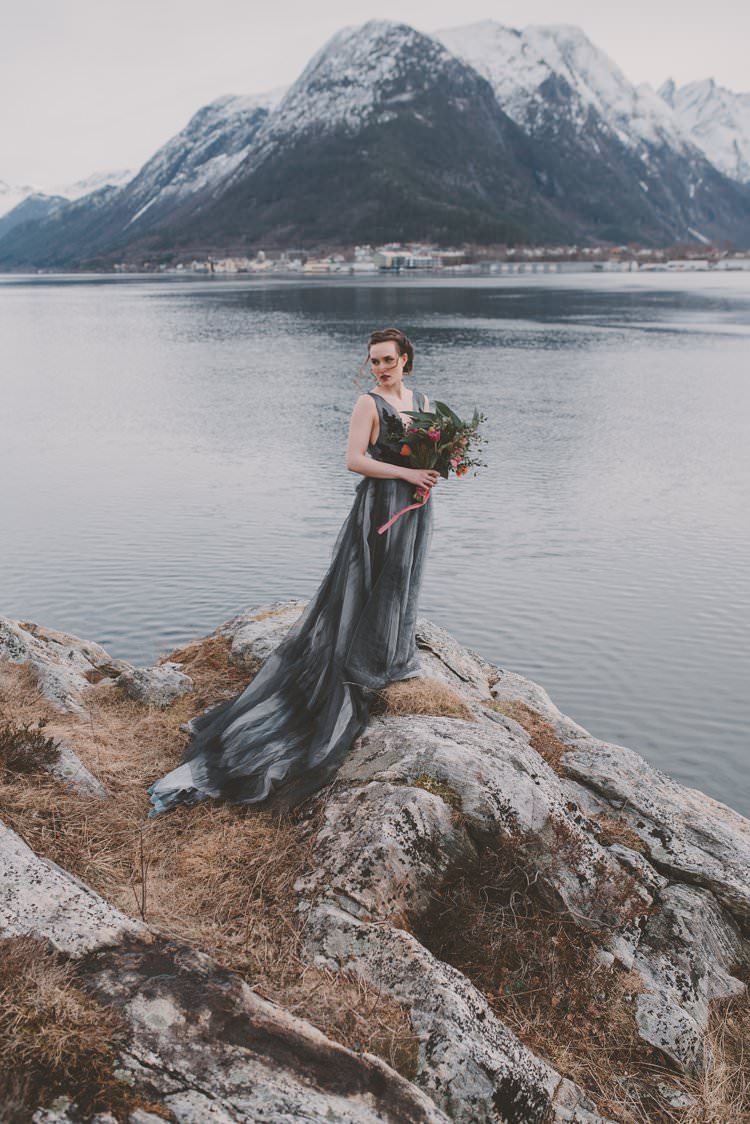 Bride Grey Black Couture Dress Norway Mountain Elopement | Moody Chic Norwegian Fjord Wedding Ideas https://www.anoukfotografeert.nl/