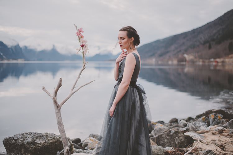 Bride Grey Dress Updo Minimalist Norway Mountain Elopement | Moody Chic Norwegian Fjord Wedding Ideas https://www.anoukfotografeert.nl/