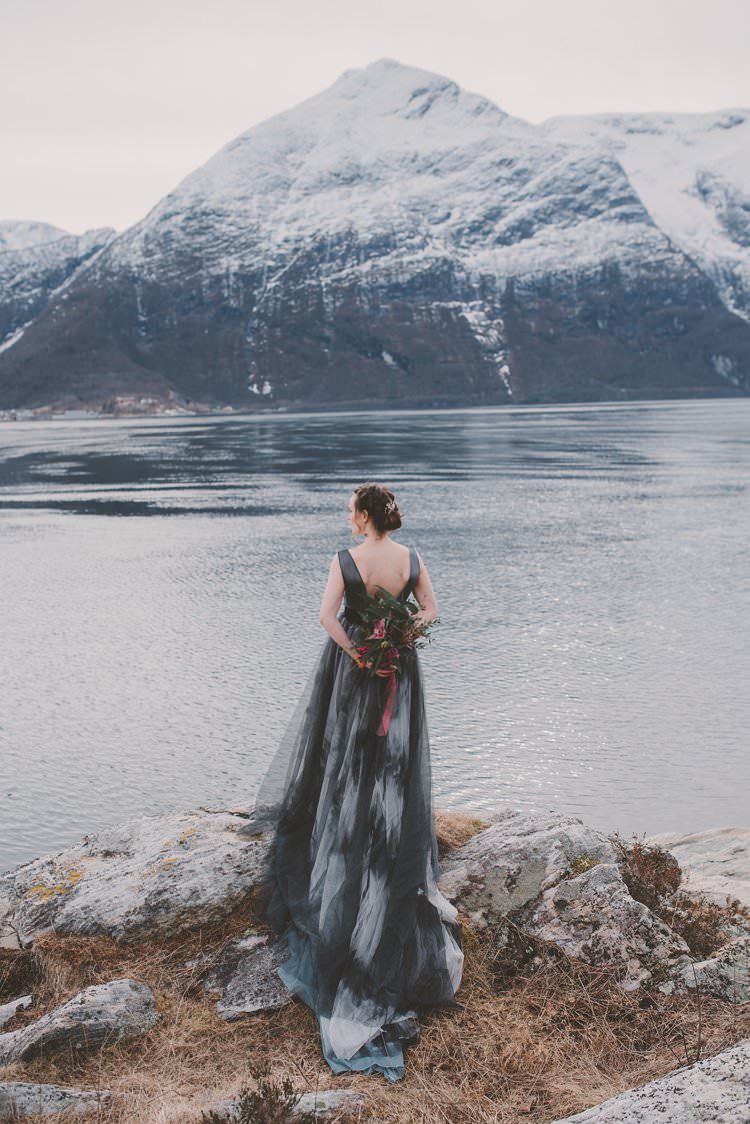 Bride Grey Black Couture Dress Bouquet Norway Mountain Elopement | Moody Chic Norwegian Fjord Wedding Ideas https://www.anoukfotografeert.nl/