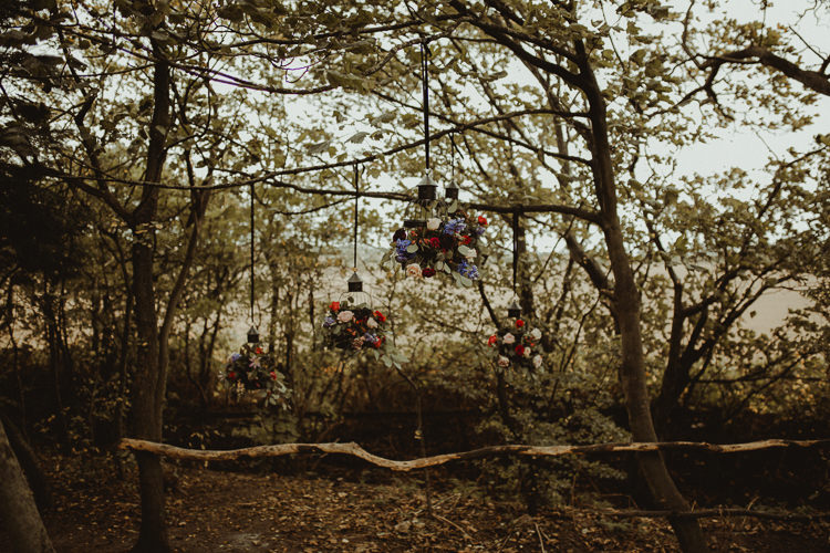 Hanging Flowers Wild Natural Black Red Greenery Moody Ethereal Winter Woodland Wedding Ideas http://belleartphotography.co.uk/