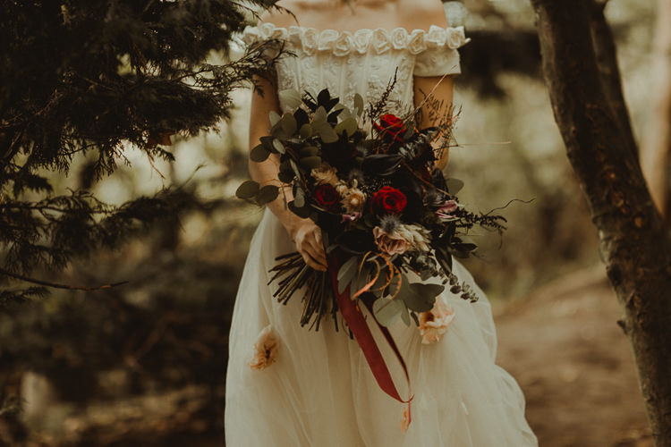 Bouquet Flowers Bride Bridal Wild Natural Black Red Greenery Moody Ethereal Winter Woodland Wedding Ideas http://belleartphotography.co.uk/