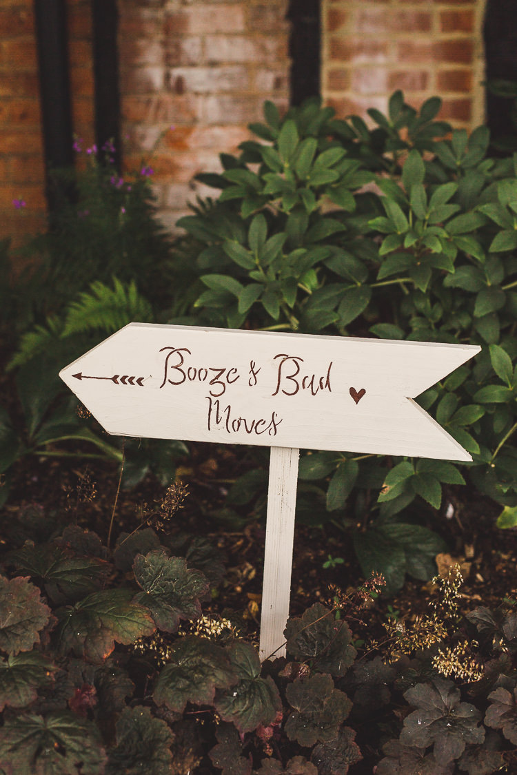 Wooden Festival Sign Post Booze & Bad Moves DIY Whimsical Romantic Barn Wedding http://kirstymackenziephotography.co.uk/