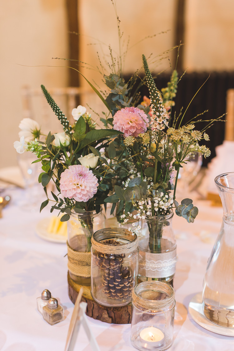 Wood Slice Table Centre Tree Jam Jars Hessian lace Twine Floral Flowers Tealight Whimsical Romantic Barn Wedding http://kirstymackenziephotography.co.uk/