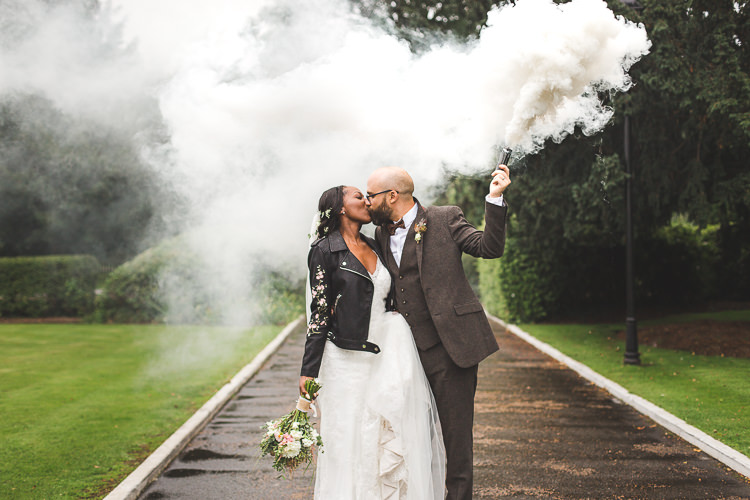 Bride Bridal Maggie Sottero Long Sleeved Lace Dress Sweetheart Leather Jacket Groom Brown Tweed Three Piece Waistcoat Bow Tie Smoke Bomb Whimsical Romantic Barn Wedding http://kirstymackenziephotography.co.uk/
