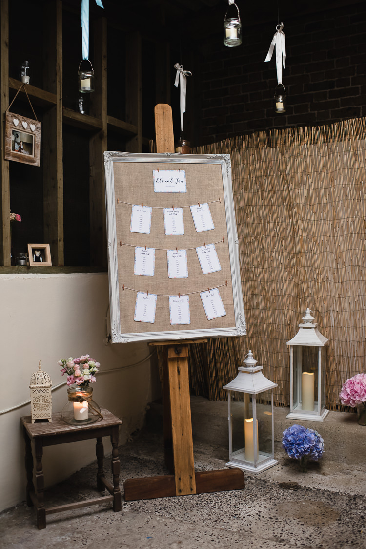 Table Plan Fram Easel Hanging Wire Barn Storm Lantern Personal Homegrown Country Farm Wedding https://www.emmahare.com/