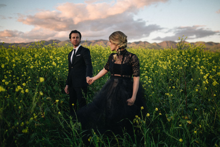 Dark Moody Black Dress Yellow Flowers Lace Sleeves Braid Bride | Edgy Emerald City Wedding Ideas http://www.yvonnegollphotography.com/