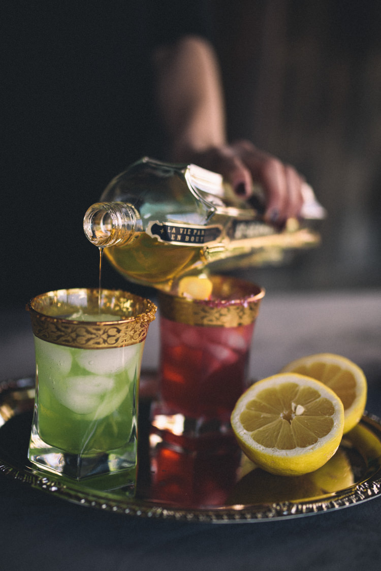 Dark Moody Green Red Black Decor Gold Glasses Drinks Bottle | Edgy Emerald City Wedding Ideas http://www.yvonnegollphotography.com/