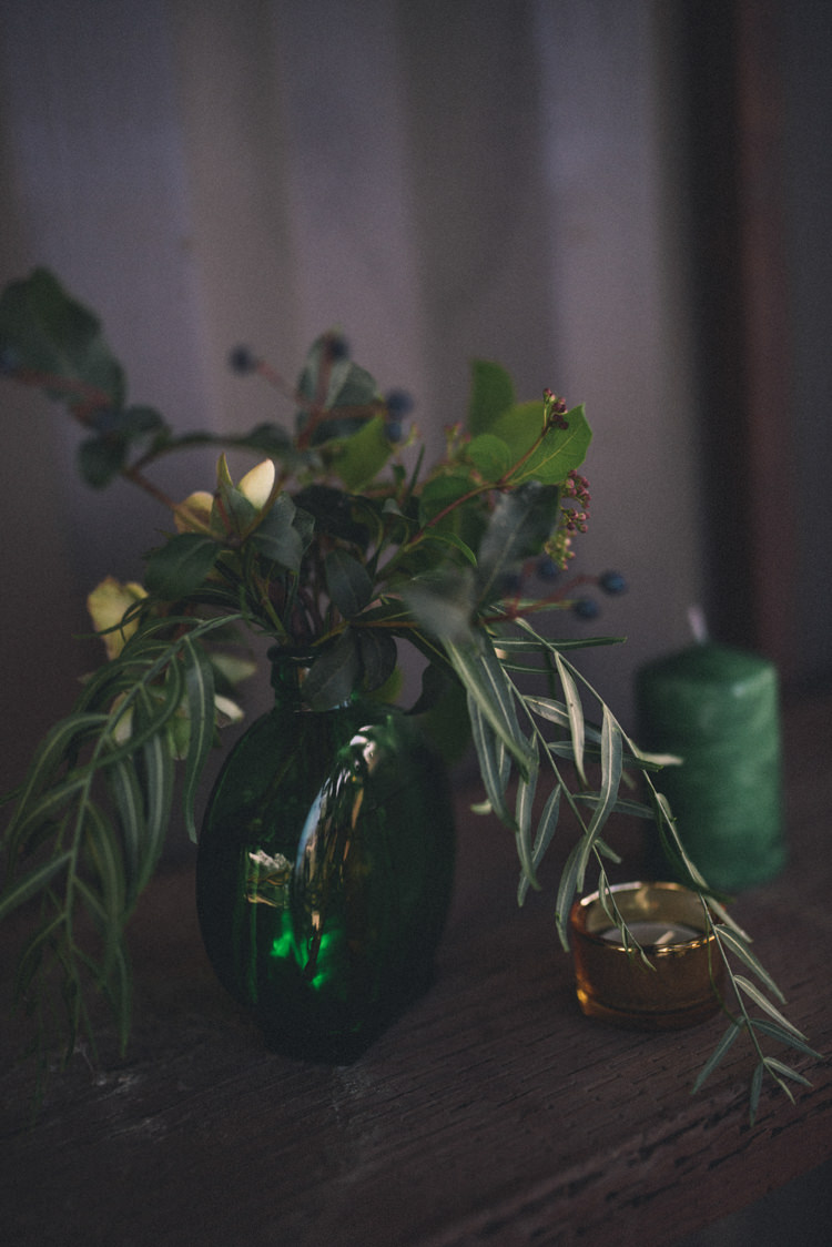 Dark Moody Green Decor Vase Flowers Candle Gold Tealight | Edgy Emerald City Wedding Ideas http://www.yvonnegollphotography.com/