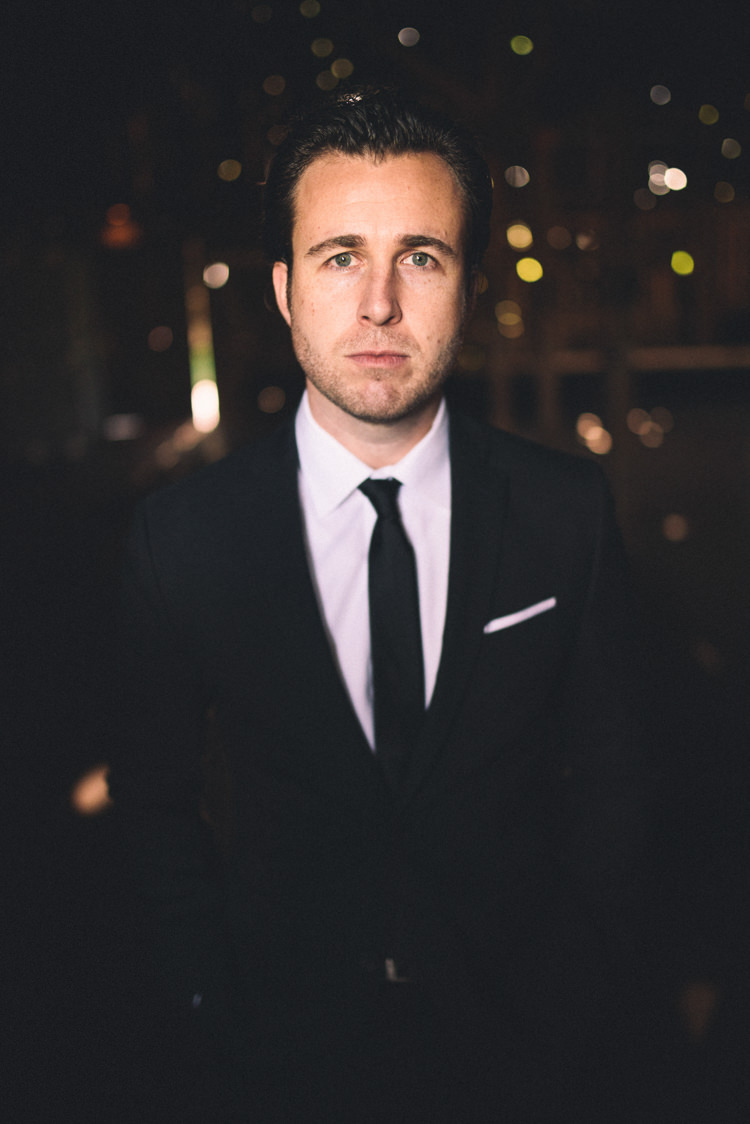 Dark Moody Black Suit Groom Portrait | Edgy Emerald City Wedding Ideas http://www.yvonnegollphotography.com/