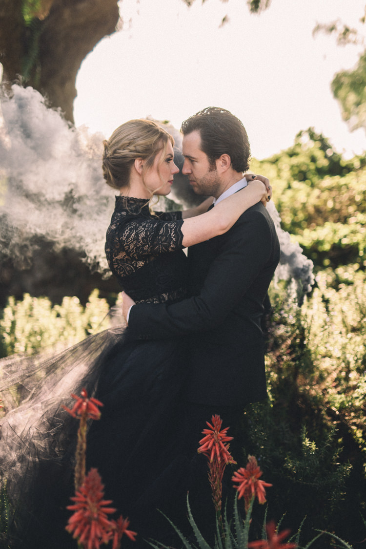 Dark Moody Black Dress Bride Groom Outdoor Smoke Photo Flowers | Edgy Emerald City Wedding Ideas http://www.yvonnegollphotography.com/