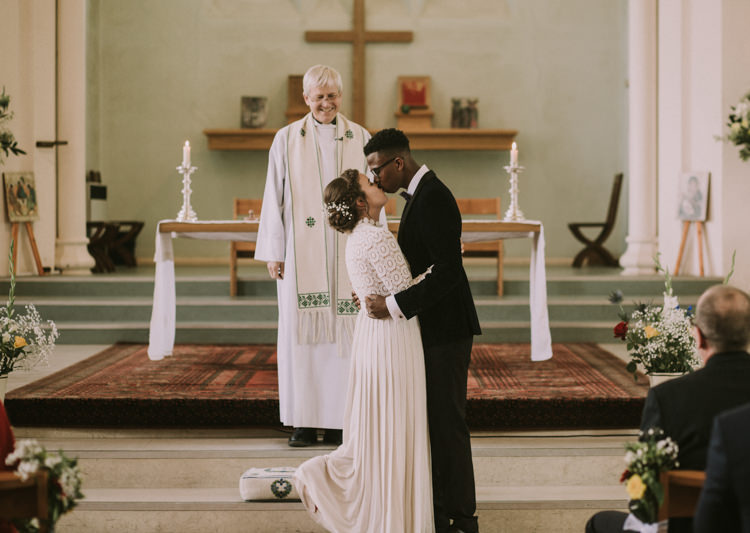 Bride Bridal Self Portrait Wedding Dress Long Sleeved High Neck Multicolour Trailing Bouquet Ribbon Plait Up Do Moss Bros Groom Velvet Tuxedo Jacket Stylish Budget Friendly Village Hall Wedding http://natalyjphotography.com/