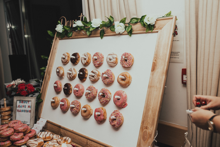 Donut Wall Wooden Frame Sweet Treat Evening Food Stylish Budget Friendly Village Hall Wedding http://natalyjphotography.com/
