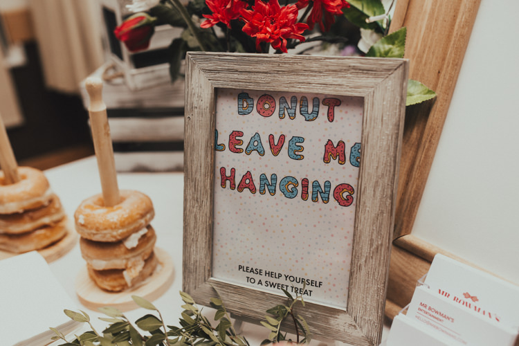 Donut Wall Donut Leave Me Hanging Sign Evening Food Sweet Treat Stylish Budget Friendly Village Hall Wedding http://natalyjphotography.com/